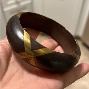 Wood bangle bracelet with gold X design tribal vibes